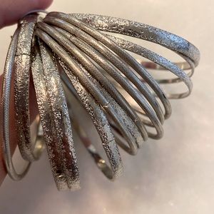 Set of 14 bangle bracelets (silver color)